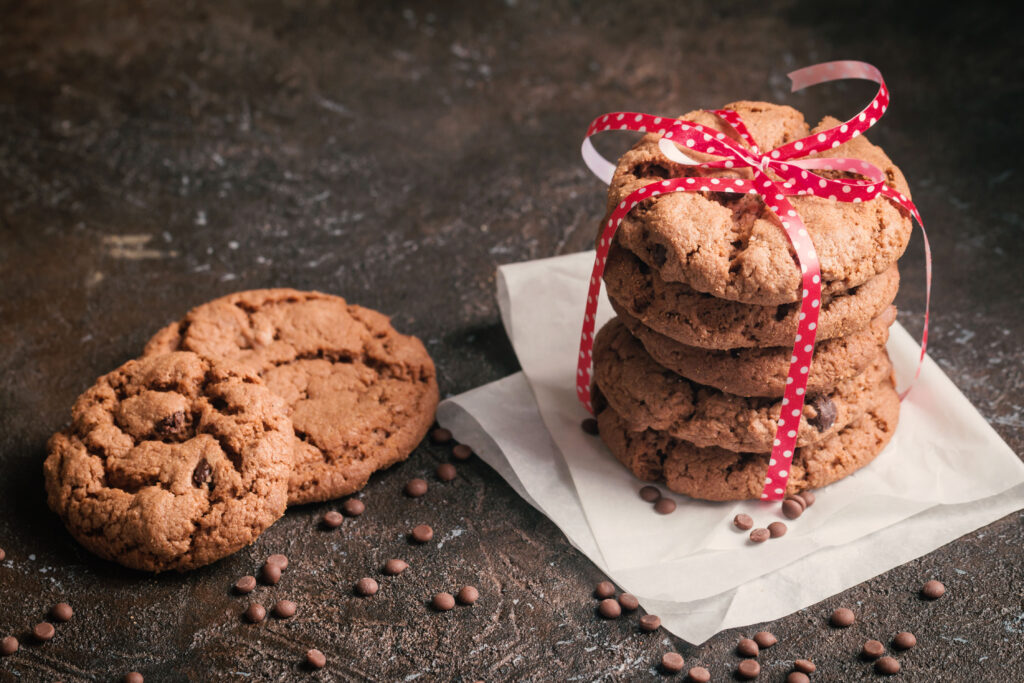 The shelf life of baked goods, such as chocolate chip cookies, can be extended and their fiber content increased using cellulose additives.